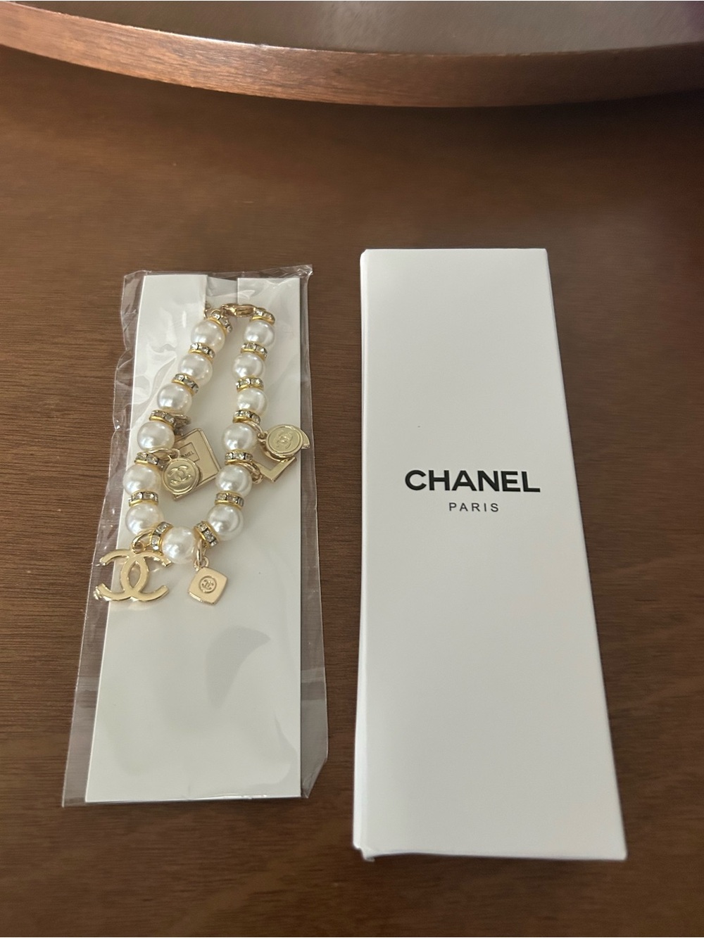 CHANEL Gold-Tone and White Pearl Charm Bracelet - Picture 7 of 7